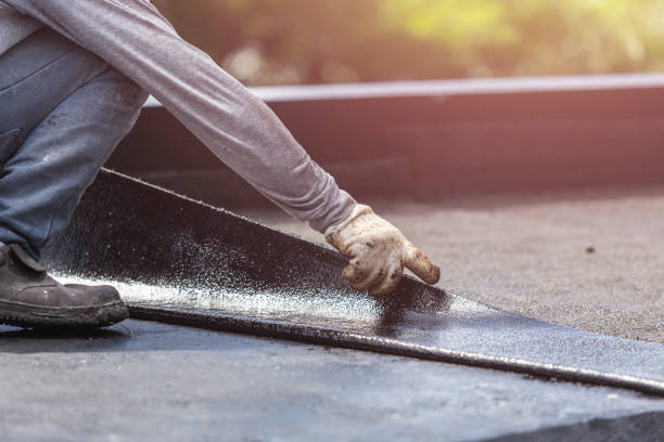 Professional Waterproofing technician working in Templeton, IN